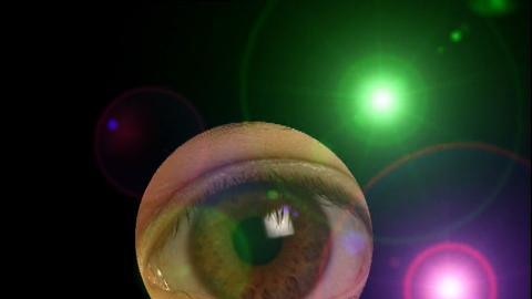 Graphic image shows human eye surrounded by coloured lights