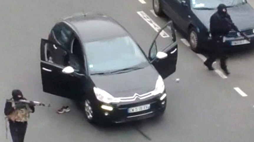 Gunmen outside offices of Charlie Hebdo