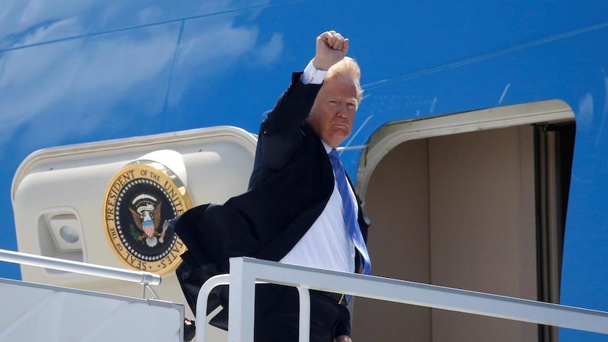 US President Donald Trump boards Air Force One at the Canadian Forces Base Bagotville in La Baie, Quebec after leaving the G7 summit on June 9, 2018