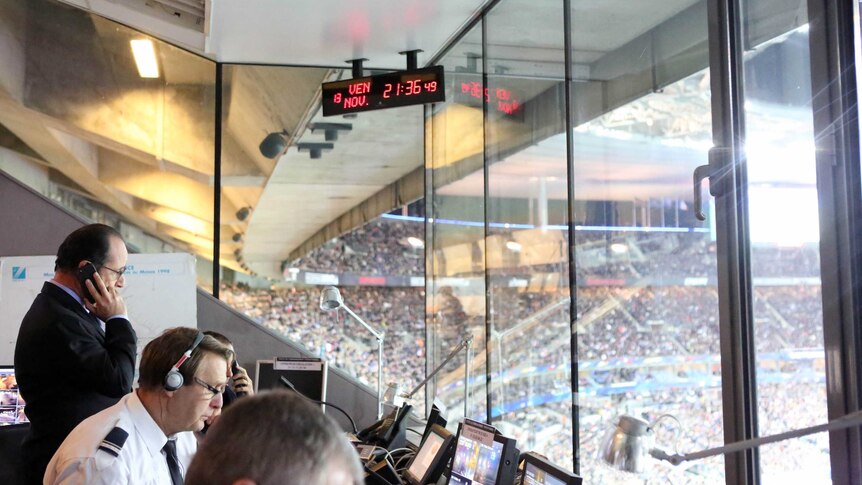 Francois Hollande in the security control room at the Stade de France stadium