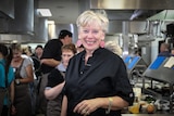 Maggie Beer standing in kitchen