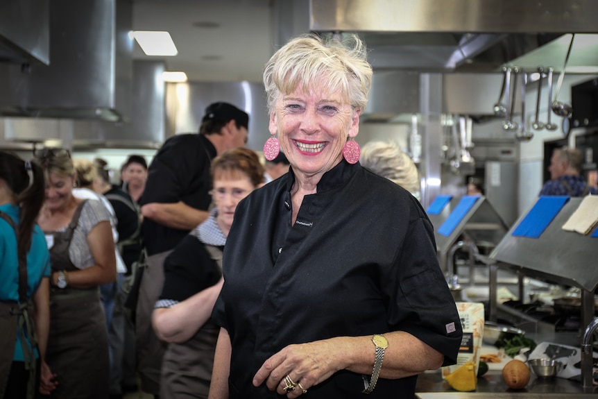 Maggie Beer standing in kitchen