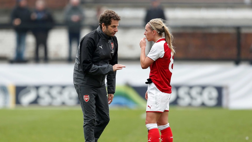 Arsenal manager Joe Montemurro speaks with Jordan Nobbs at half time of their FA Cup semi-final with Everton