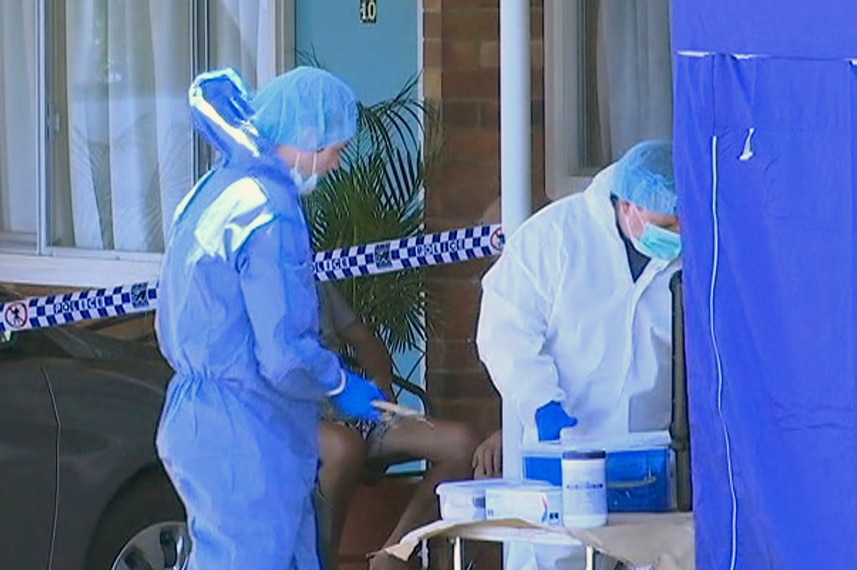 Police officers outside a Maryborough motel room where a woman's body was found in the early hours of November 3, 2018.