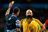 Marching orders ... Will Genia is shown a yellow card by referee Craig Joubert against Wales