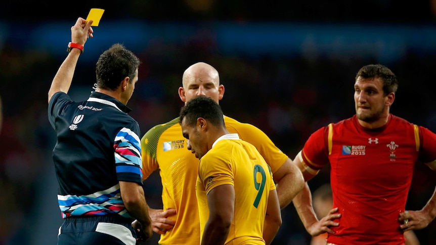 Marching orders ... Will Genia is shown a yellow card by referee Craig Joubert against Wales
