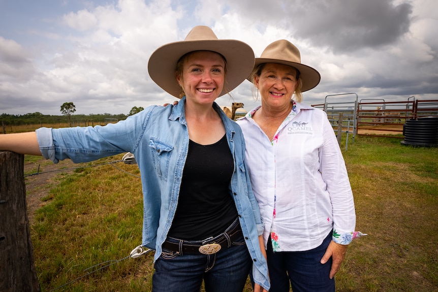 Photo of two women, one older and one younger smiling.