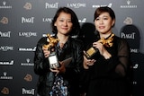 Fu Yue poses with her Best Documentary 'Golden Horse'