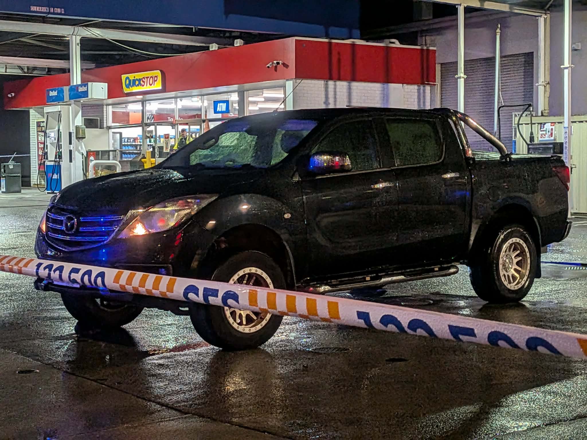 Worker dies in hospital after being dragged under ute at service station