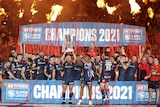 Fire is blasted into the air and confetti rains down as St Helens celebrates with the Super League trophy
