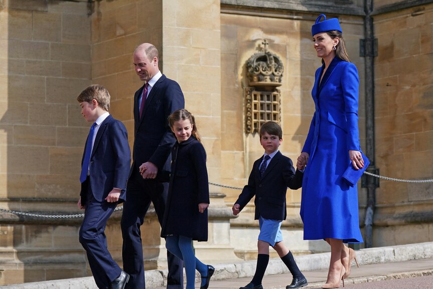 The Prince and Princess of Wales with Prince George, Princess Charlotte and Prince Louis walk into church