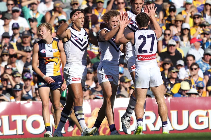 Dockers celebrate a Lachie Neale goal