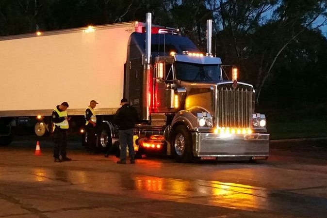 Baiada trucks being searched by NSW Police.