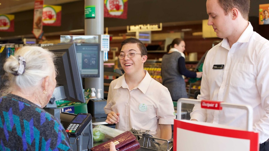 Nambucca Valley resident Jacob Bush is achieving inclusion, working as a cashier in his local community