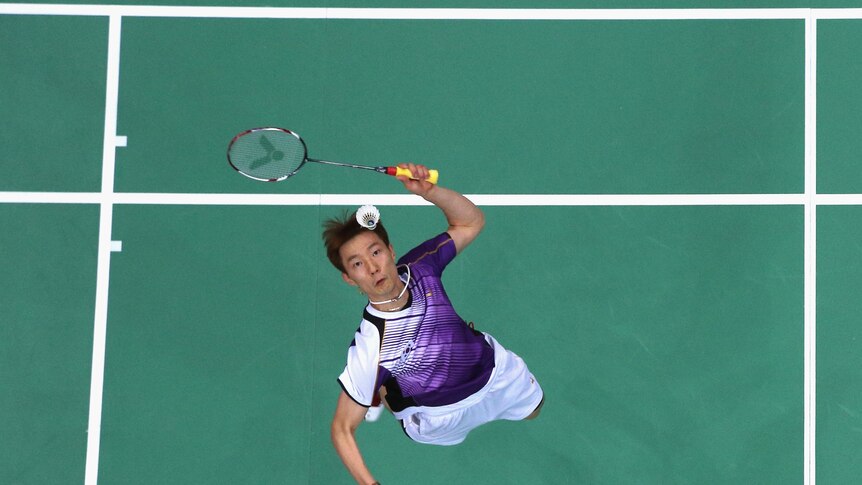 Keep your eye on it ... Korea's Hyun Il Lee hits out in the men's singles badminton bronze medal match.