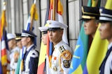 South Korean honour guards stand in front of a war memorial July 27, 2013