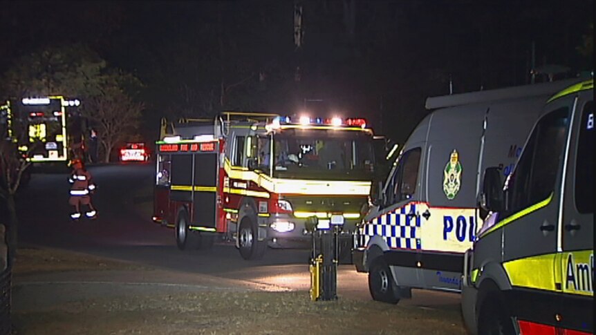 Emergency services at a house in western Brisbane where police found explosives.