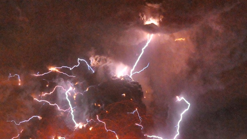 Volcanic lightning strikes above Shinmoedake peak as it erupts