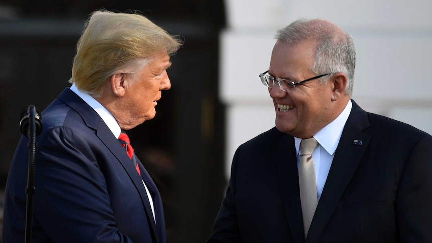 Trump and Morrison greet each other outside the White House