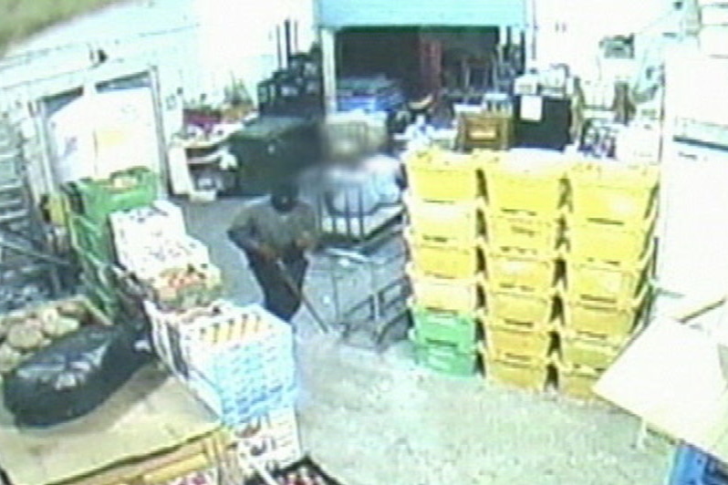 Armed robbery on Quinns Rocks supermarket (CCTV still)