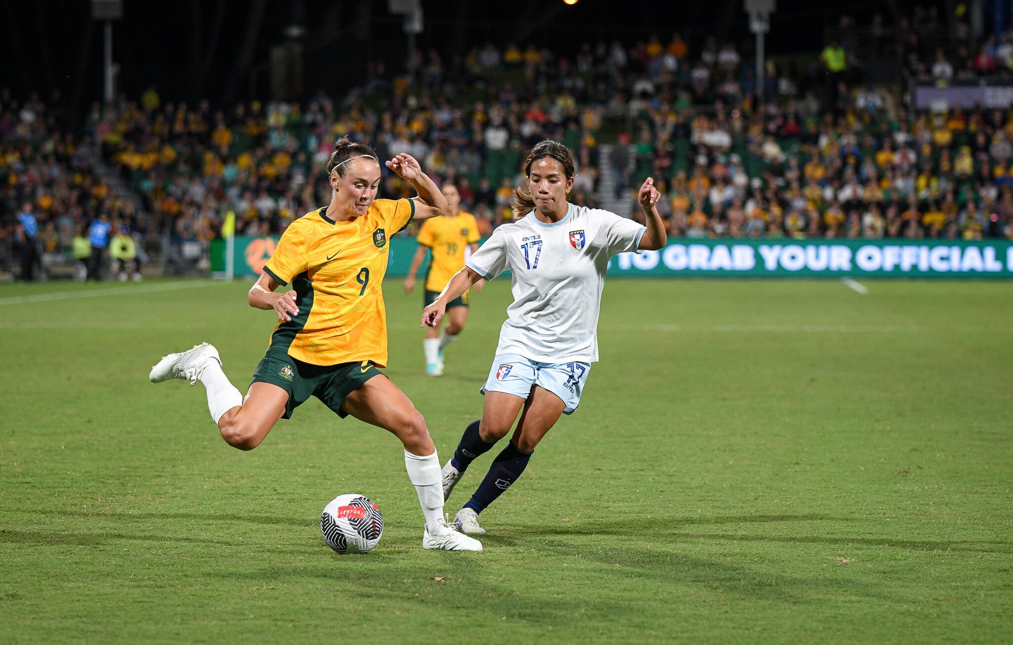 Caitlin Foord about to boot the ball in Perth.