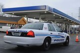 American police car at a petrol station