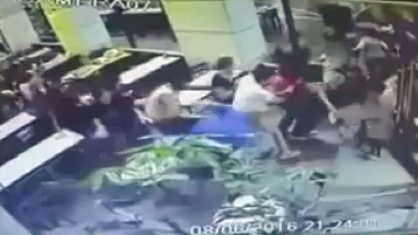 Footage shows patrons fleeing as shooters open fire inside Tel Aviv cafe