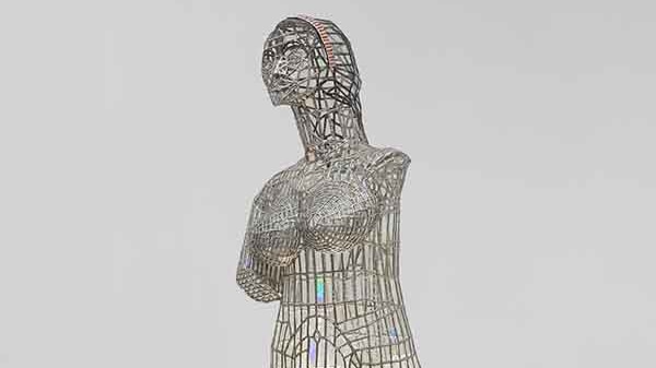 A mosaic torso of a woman.