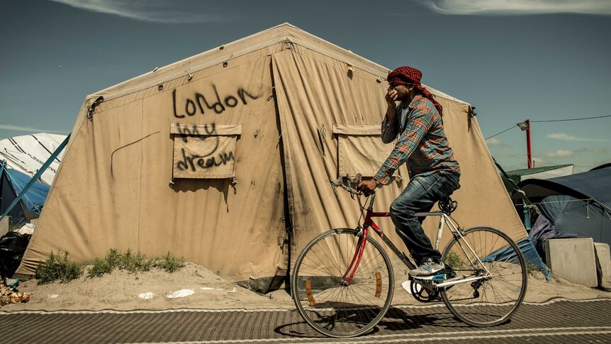 'London my dream' graffitied on one of the many tents that make up the 'jungle' camp for migrants and refugees in Calais.