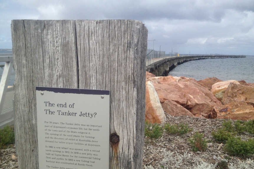 Plaque at the end of a jetty.