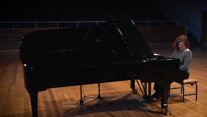 Tamara-Anna Cislowska performs on a grand piano in the Eugene Goossens Hall, ABC Ultimo Centre.