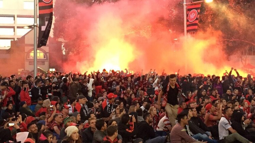 Wanderers fans with flares