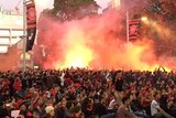 Wanderers fans with flares