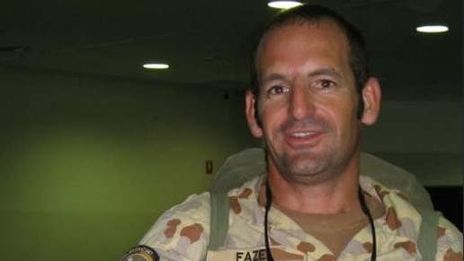 Man in uniform smiling