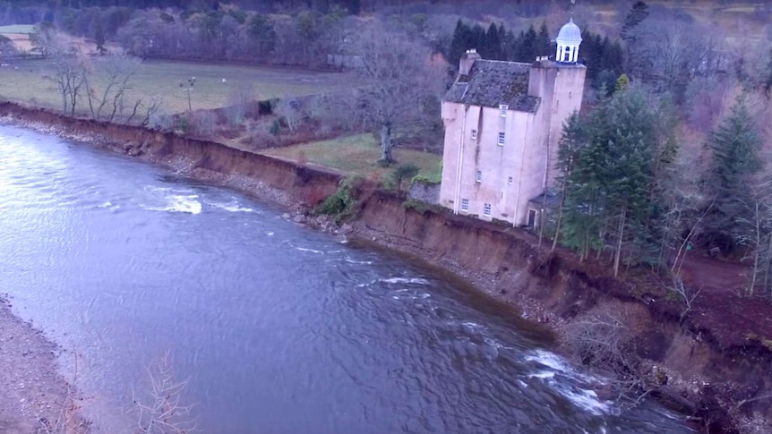 Abergeldie Castle in Scotland is threatened by a swollen river
