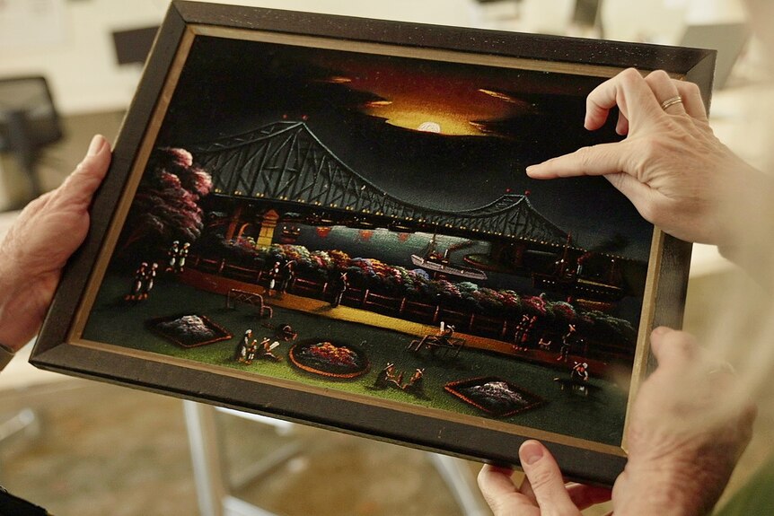 A dark painting of the Story Bridge.
