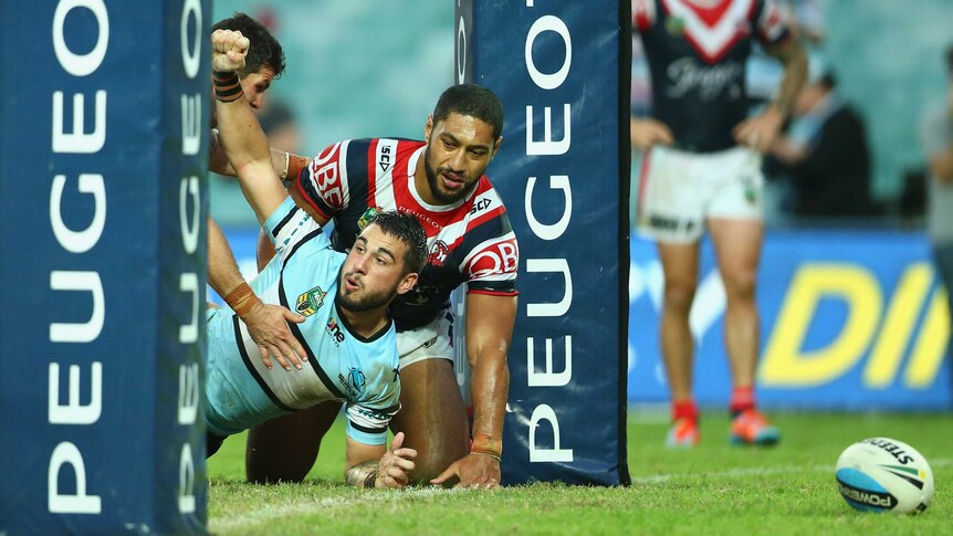 Cronulla's Jack Bird celebrates his try against the Sydney Roosters at the Sydney Football Stadium.