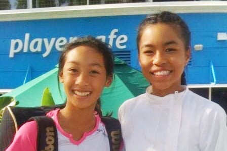 Tennis players Lizette Cabrera and Priscilla Hon smile for a photo.