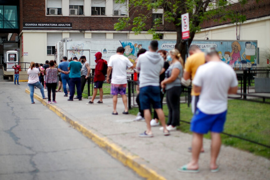 A line of people outside a hospital in Buenos Aires waiting to get tested.