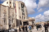 A damaged building at the site of an explosion in Syria's northern city of Aleppo
