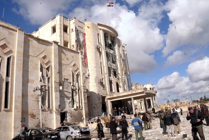 A damaged building at the site of an explosion in Syria's northern city of Aleppo