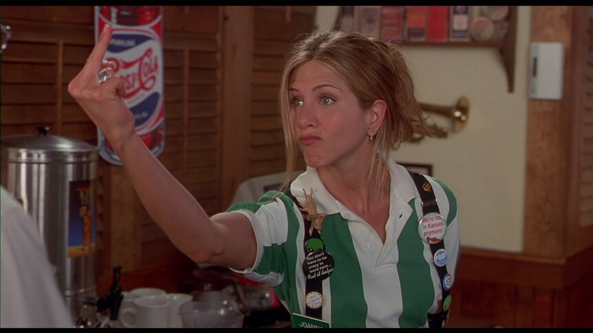 Jennifer Aniston makes a rude gesture in the movie Office Space