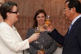 Australian Ambassador toasts champagne with the Cambodian government
