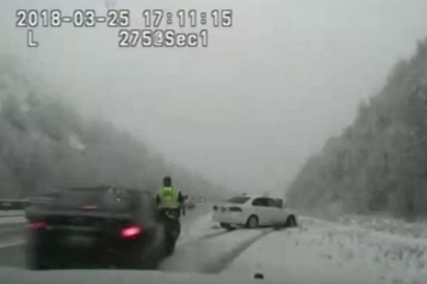 A screenshot from the dashcam footage shows the moment of impact.
