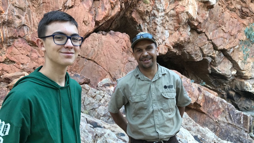 Miguel Braga and Daniel McCormack stand in a rocky gorge
