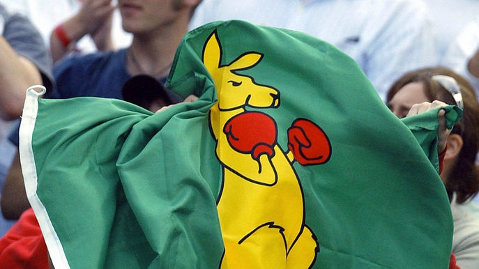 Australian tennis fans waving an Australian boxing kangaroo flag