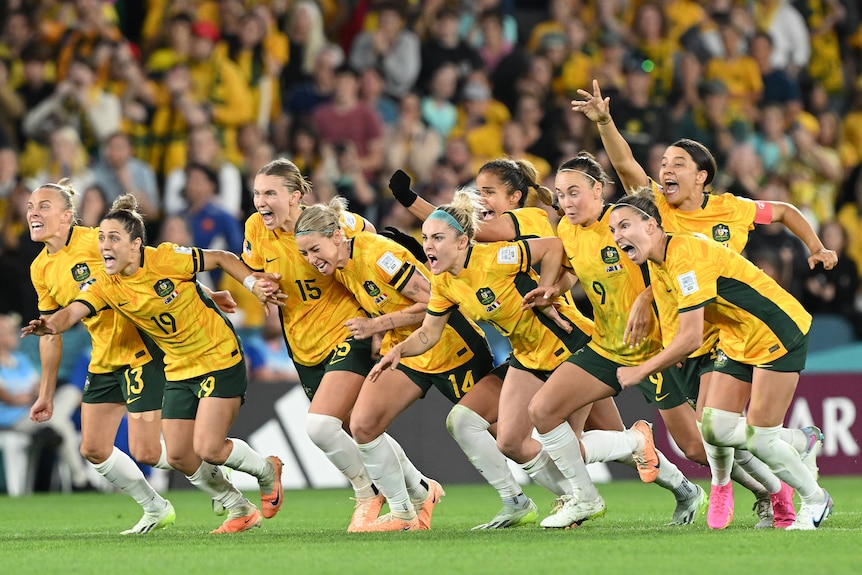 The Matildas take off sprinting in a line