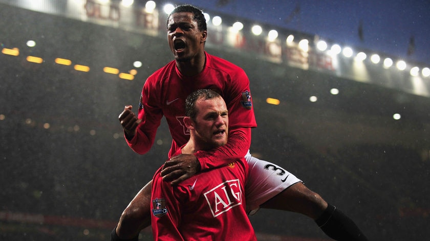 Patrice Evra (top) wants to continue to win trophies at Old Trafford.