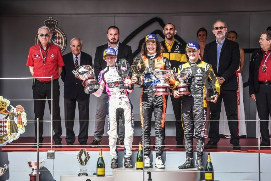 Alex Peroni on the podium after winning in Monaco.