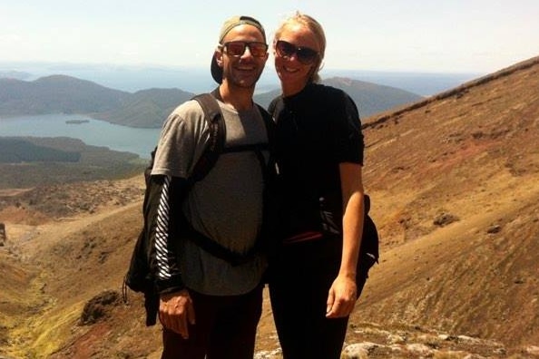 A photo of Anthony and his partner Mette standing outdoors. 